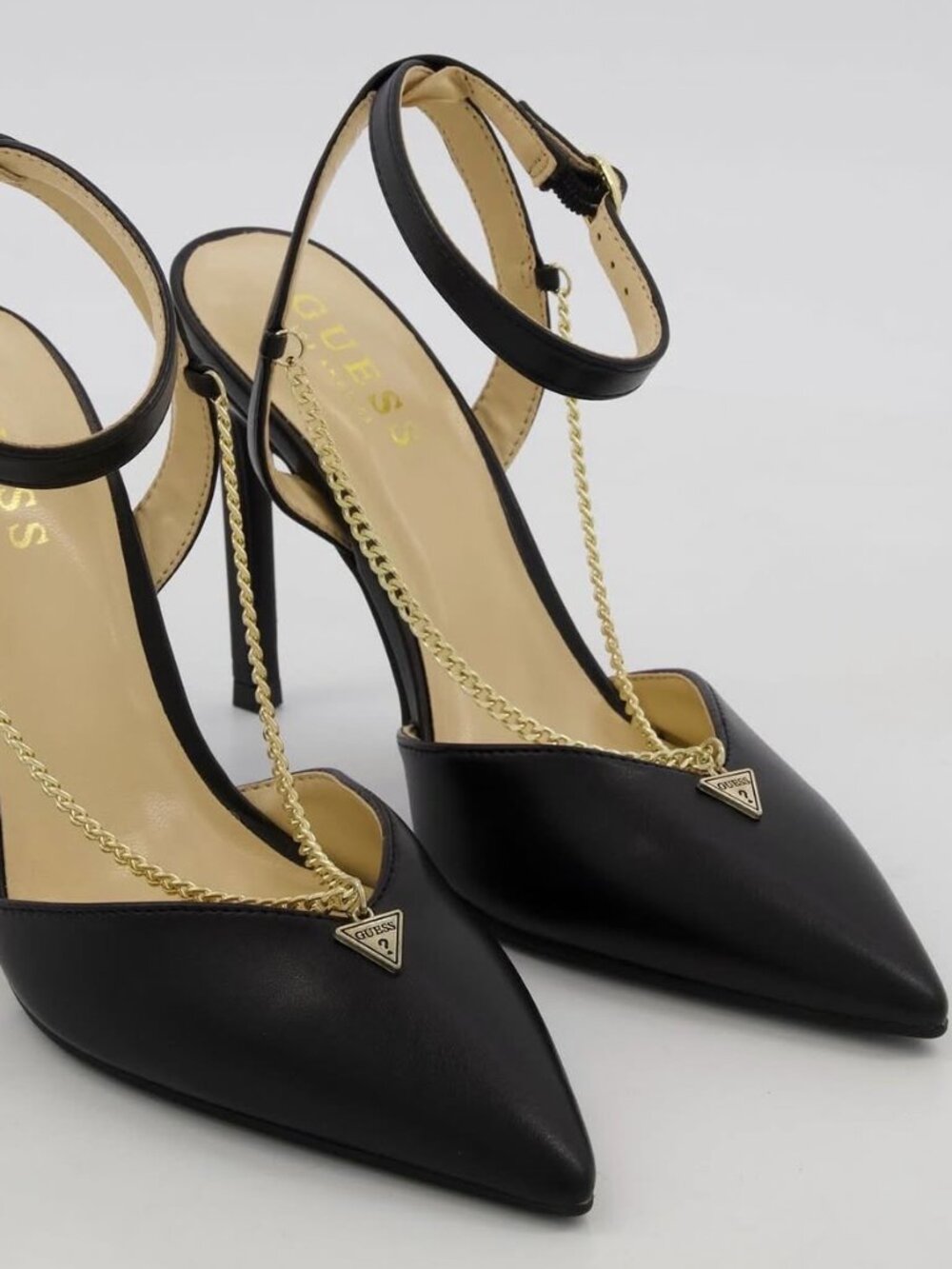 GUESS Black Pointed-Toe Stiletto Heels with Gold Chain Accent